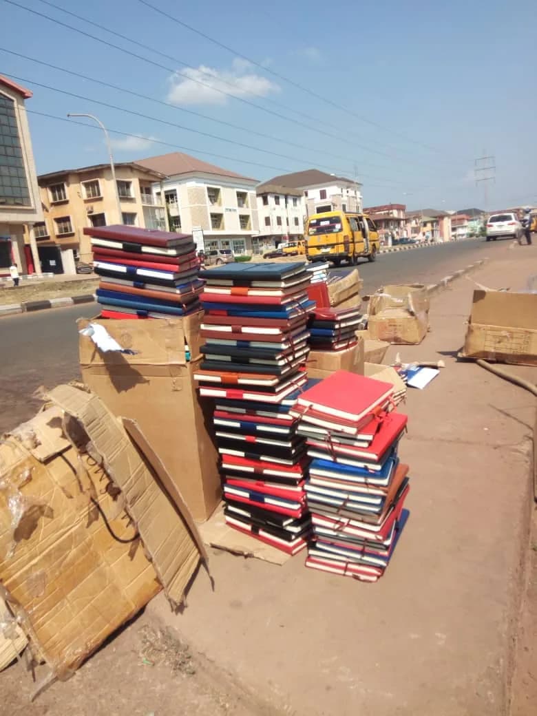 Stacks of executive leather-bound corporate diaries
