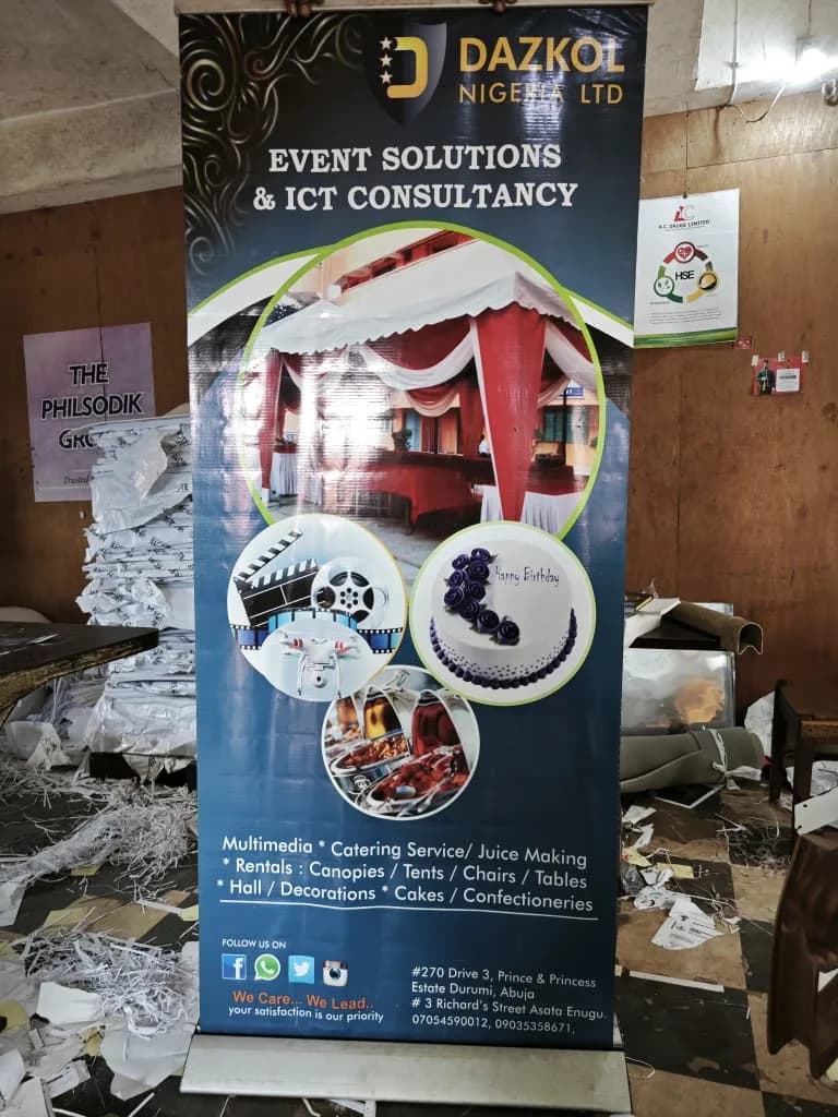 Wide outdoor event flex banner with corner eyelets